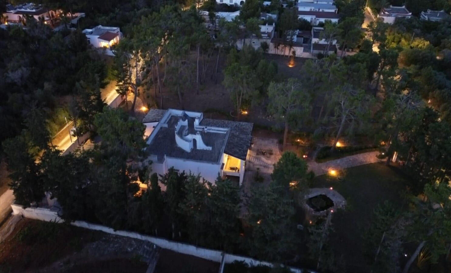 Aerial lighting design and stone paving courtyard by Studio 183. Progetto illuminotecnico pavimentazione esterna villa di lusso Salento Italy